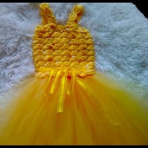 Vestido blusa tejida y falda en tur